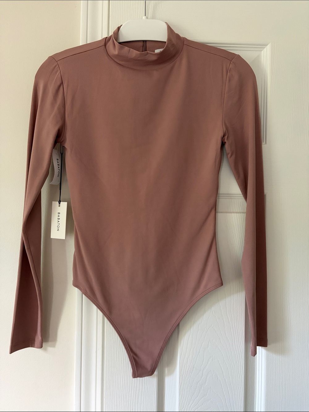 Aritzia Bavarian dusty mauve bodysuit. Brand new with tags